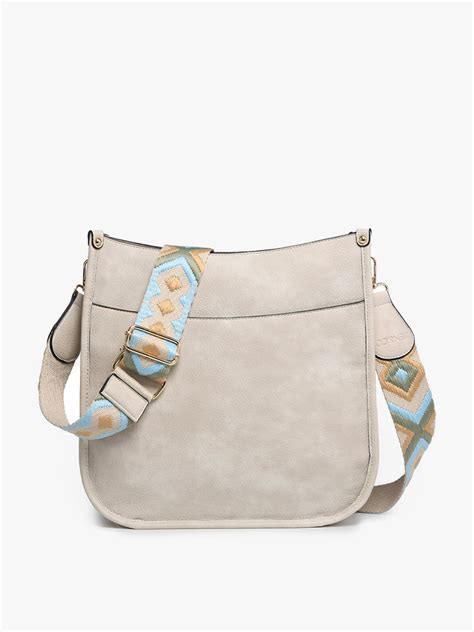 chloe crossbody with guitar strap.